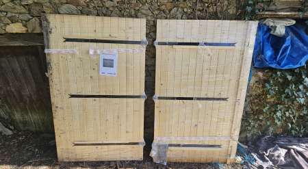 Vends porte de garage 2 ventaux