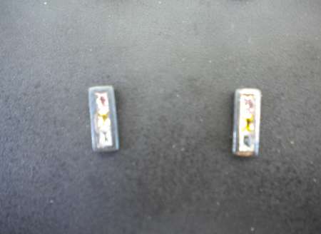 BOUCLES DOREILLES (un)