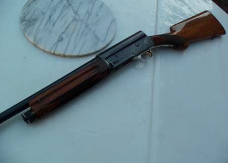 fusil. Browning.....